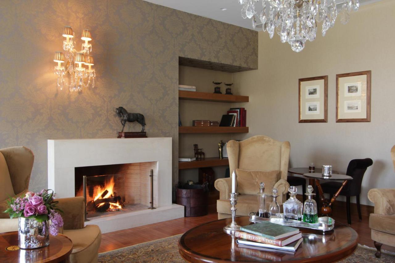 Hotel Du Lac Congress Center & Spa Ioannina Exterior photo A fireplace in a living room