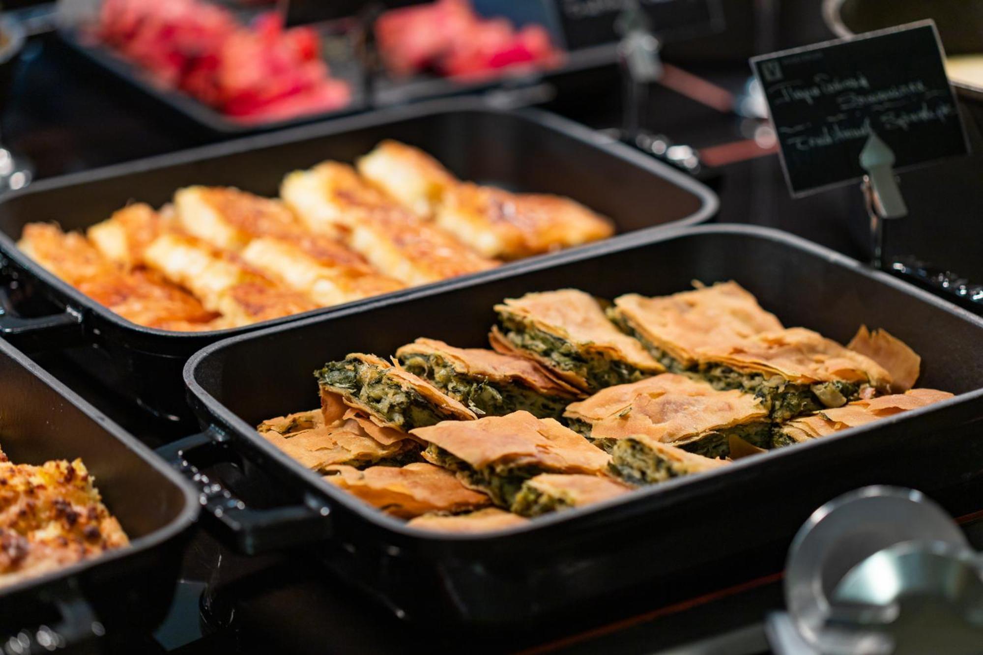 Hotel Du Lac Congress Center & Spa Ioannina Exterior photo A selection of food at a buffet